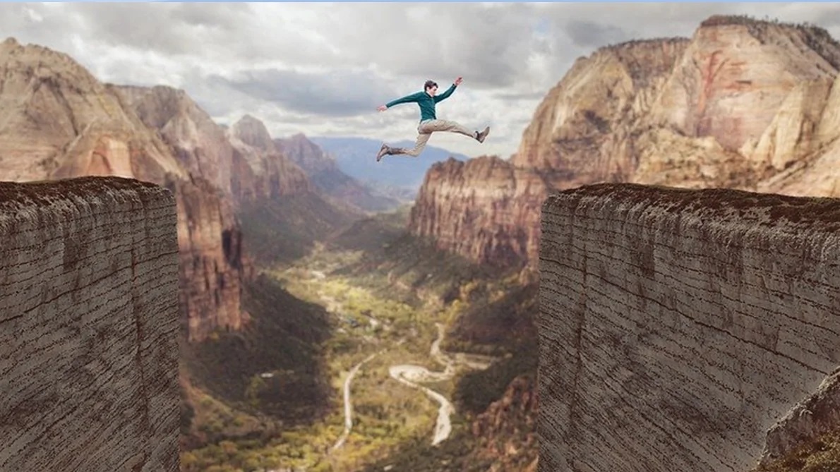 man jumping with confidence