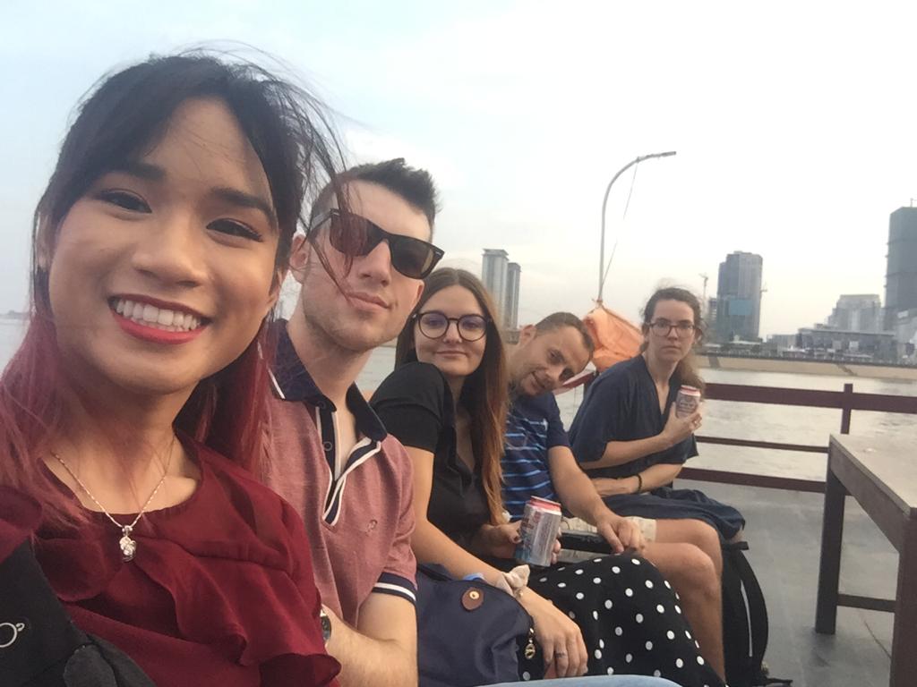 TEFL teacher in Cambodia with a group of friends - tefl job vs internship