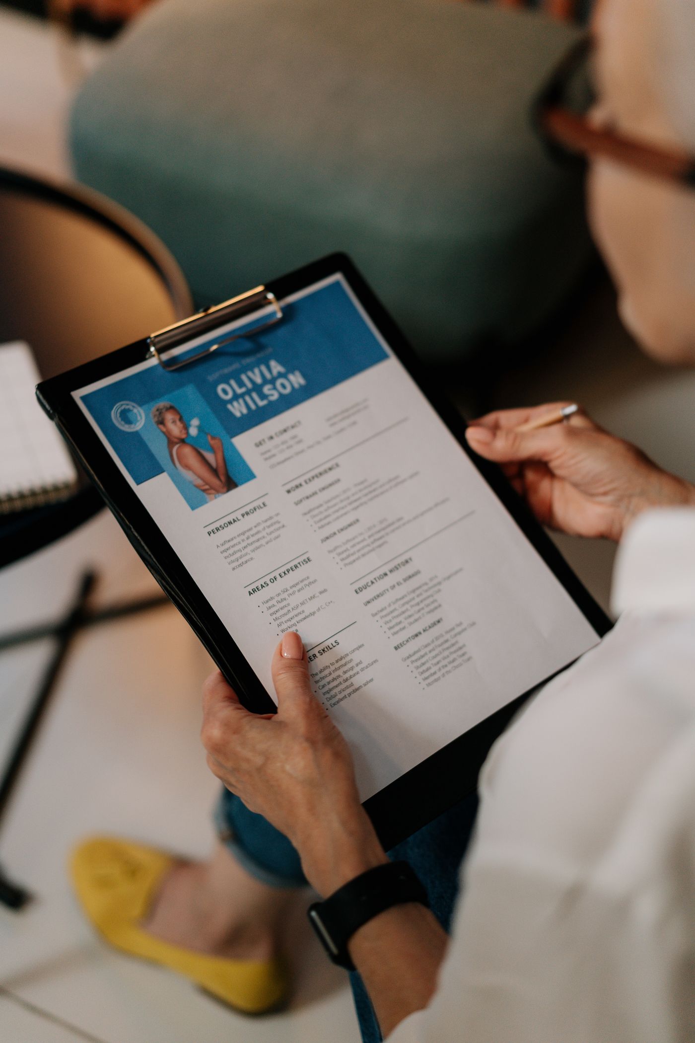 Prospective teacher checking TEFL certificate details against an official qualification register