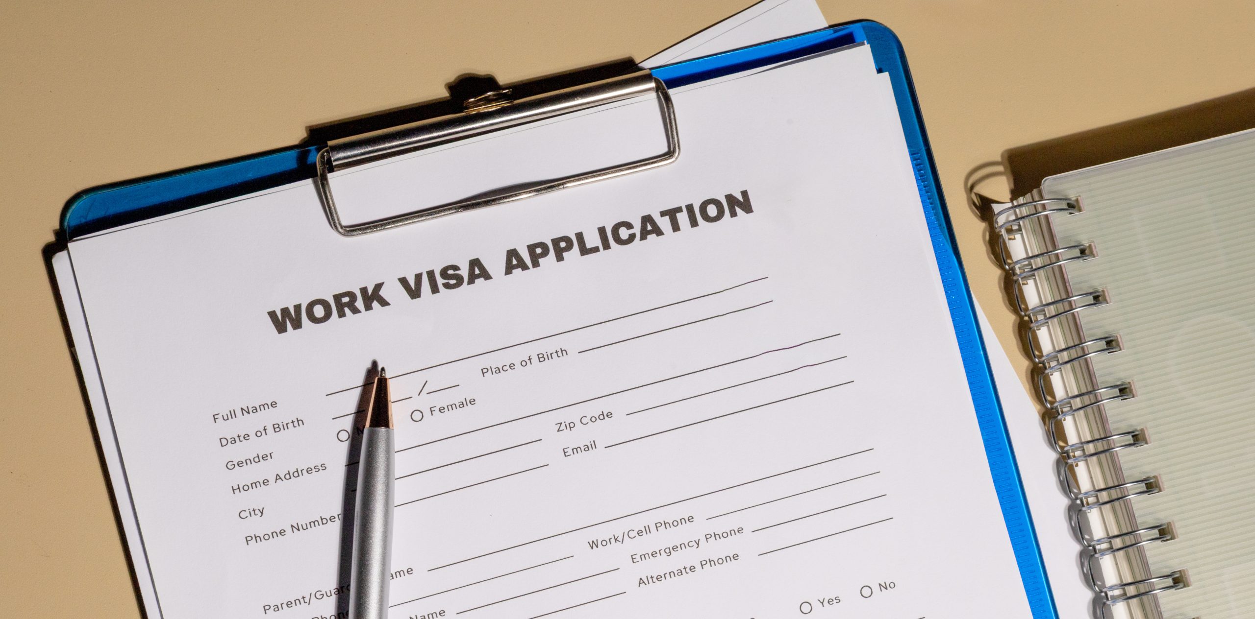 Teach English in Japan without a degree: work visa application document on a clipboard