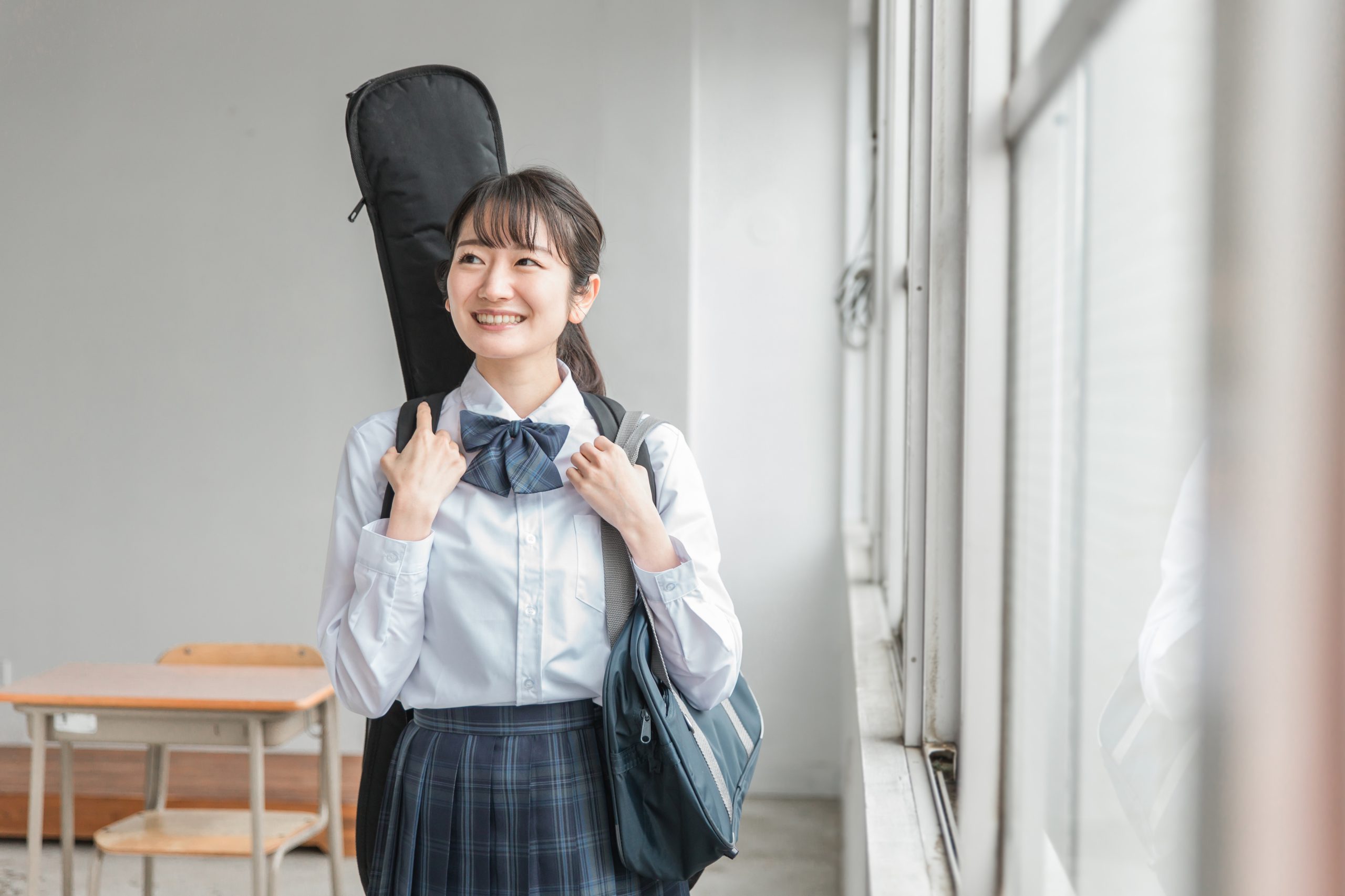 Students in uniform in a Japanese school classroom, the setting JET Programme teachers are placed in