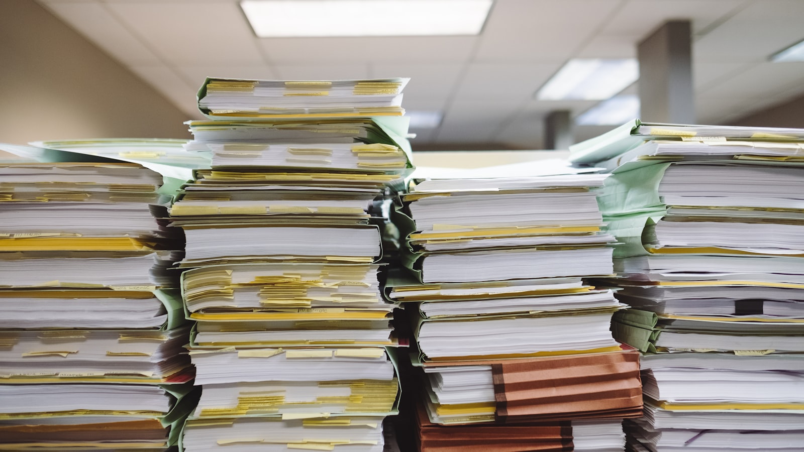 stacks of certification paperwork relevant to ofqual level 5 tefl verification for americans