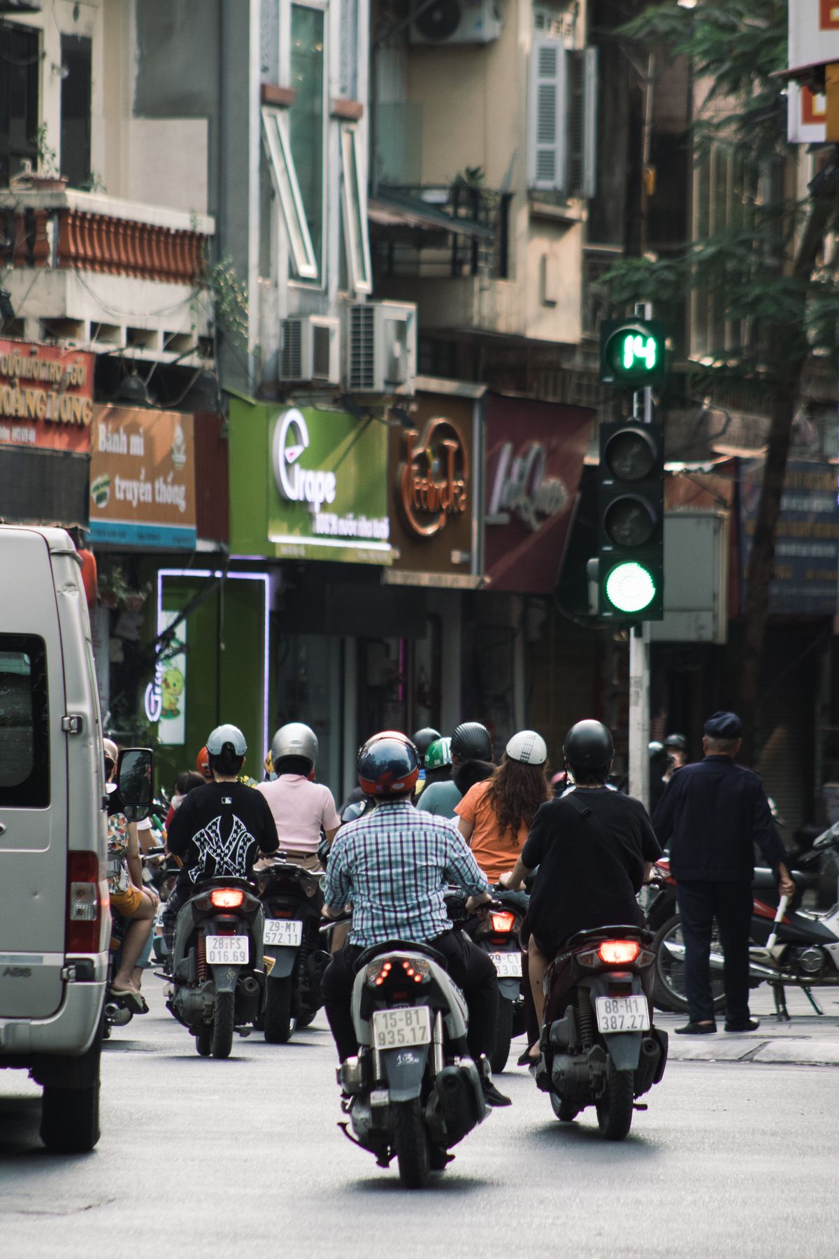 Busy Hanoi street with motorbikes in Vietnam, a common paid TEFL internship destination in South East Asia