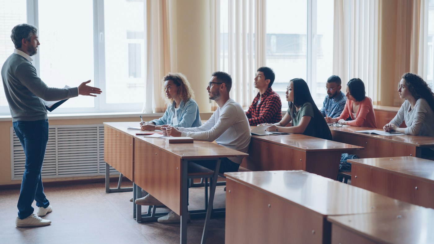 Early career teacher taking a whole class lesson during the two year induction period