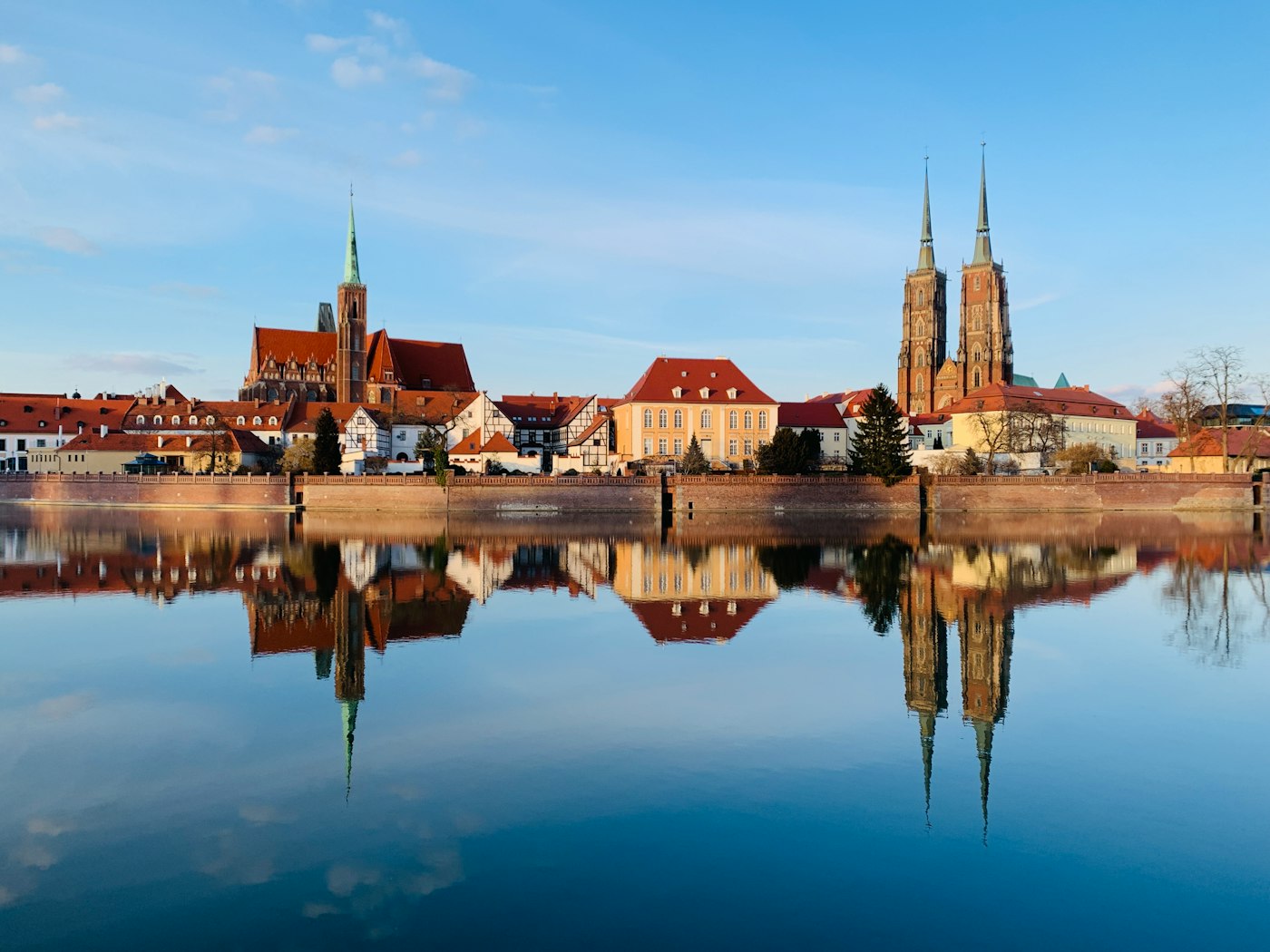 Riverside architecture in Wroclaw, a university city with steady demand for English teachers in Poland
