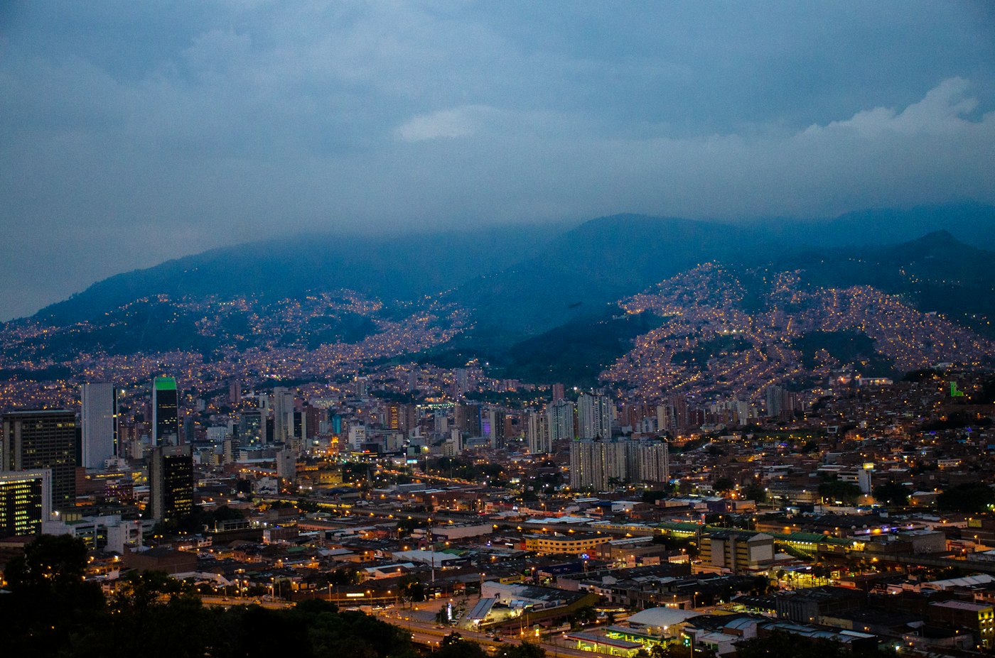 Colombian city skyline at night, where English teachers balance rent, transport and evening classes